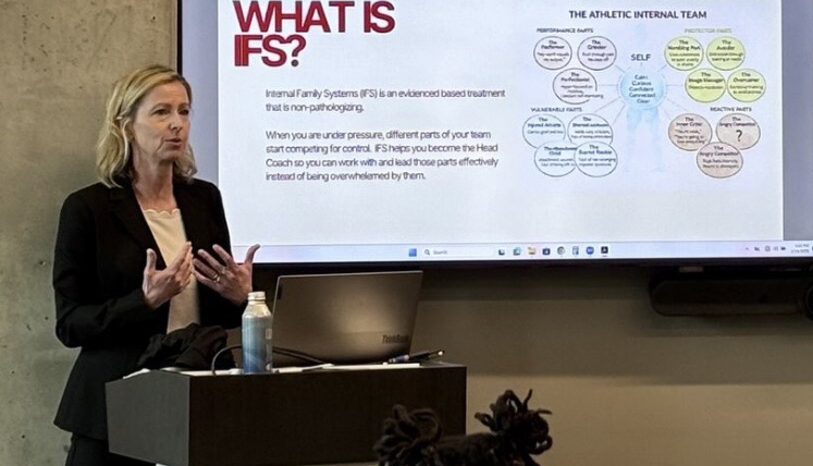 Whitney Dittmar presenting on EMDR and IFS for addiction recovery in athletes and nervous system regulation during a conference