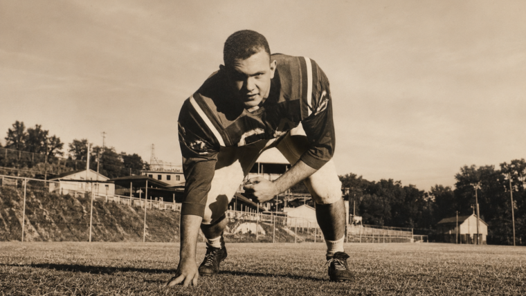 College football player from the 1960s whose career-changing injury led to a journey of athlete identity after injury and recovery.