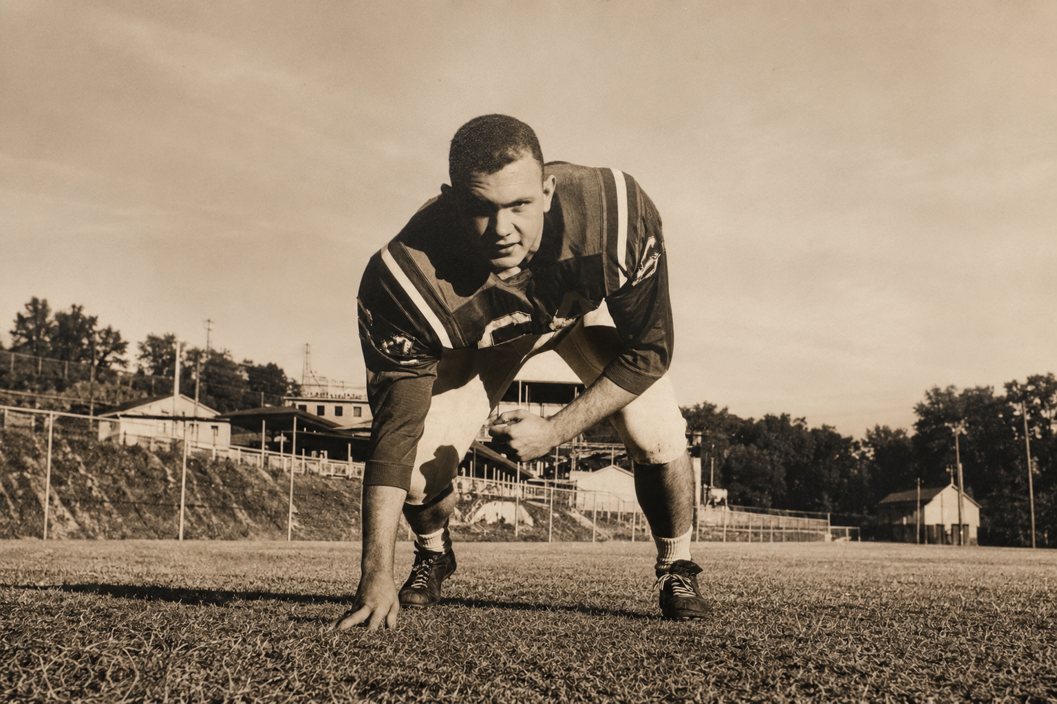 College football player from the 1960s whose career-changing injury led to a journey of athlete identity after injury and recovery.