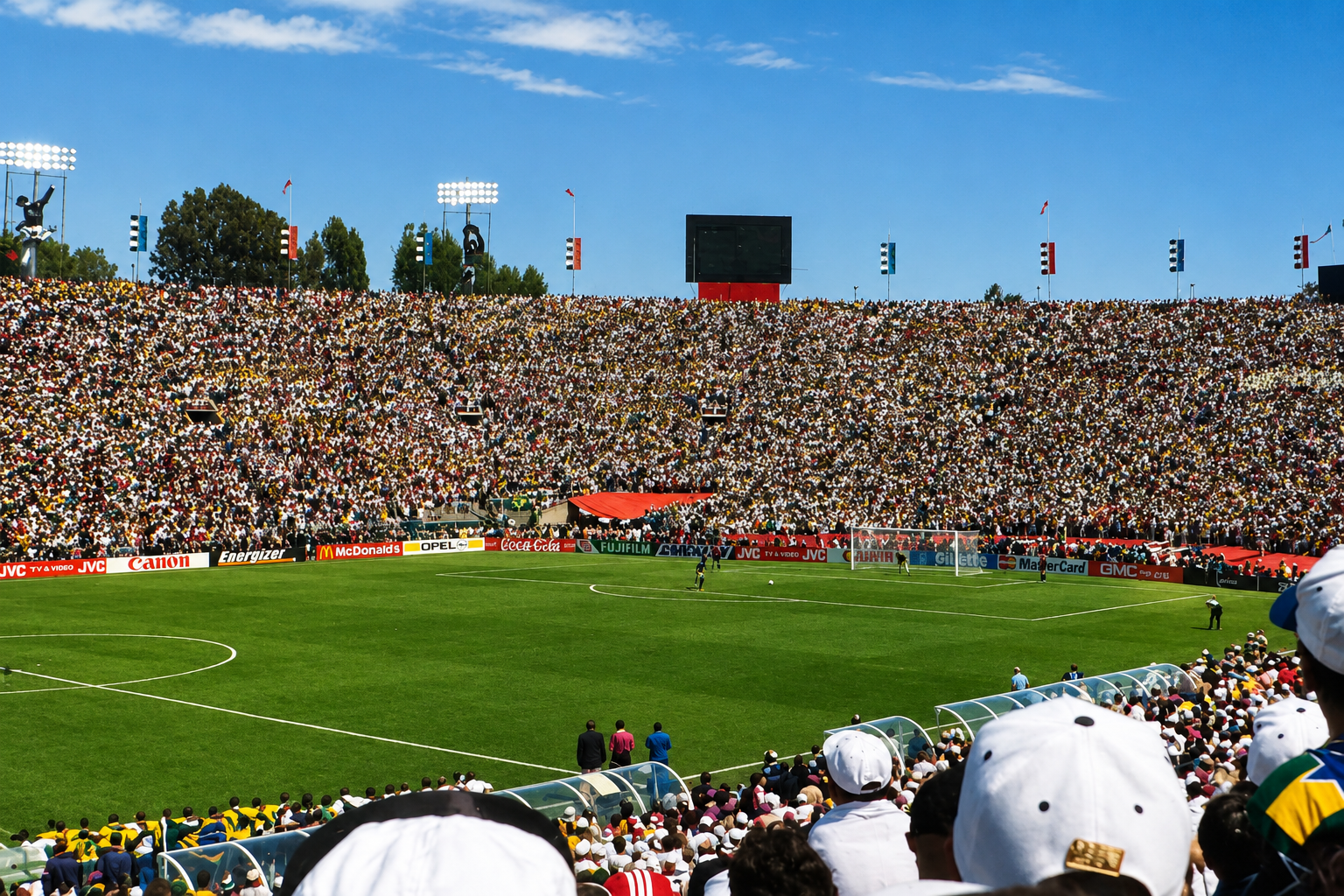 A packed stadium during the 1994 FIFA World Cup Final as players prepare for a decisive penalty kick, illustrating athlete nervous system regulation under extreme competitive pressure.